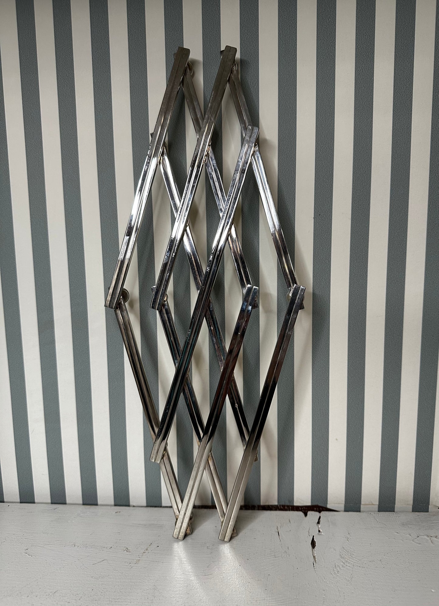 Dessous-de-plat extensible en métal chromé - produit chiné