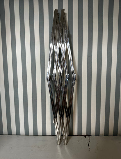 Dessous-de-plat extensible en métal chromé - produit chiné